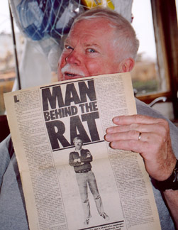 Jimmy holding an article from 25 years ago