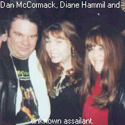 Dan Mc Cormack with Diane hammil and unknown assailant.